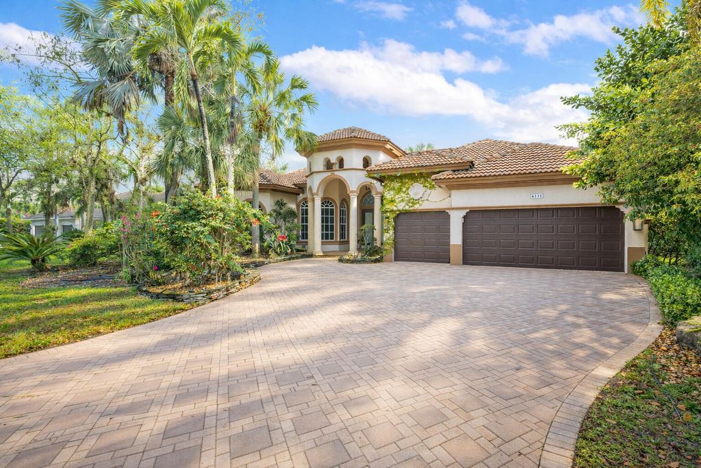 Photo of 6135 NW 88th Avenue, Parkland, FL 33067 (MLS # B26002096)