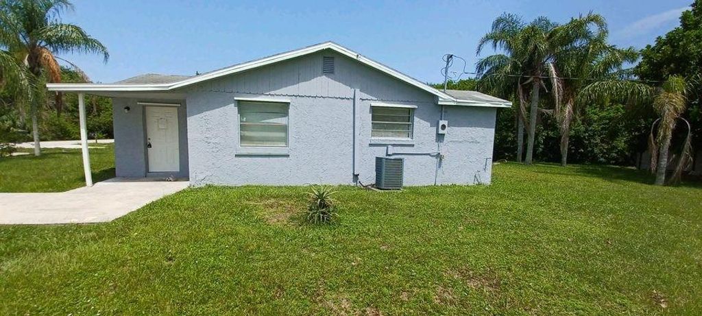 Photo of 1611 Valencia Ave, Fort Pierce, FL 34946 (MLS # F10389342)