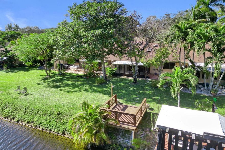 Waterfront villa in Boynton Lakes! Enjoy your private deck on a canal that opens to a lake, with passing boats and serene water views. This 2-bedroom, 2-bath home offers a spacious kitchen, enclosed patio, and great potential for customization.  The roof was recently replaced, and the skylights are hurricane proof.  
Community amenities include pool, tennis, pickleball, and walking paths—close to I-95, shopping, dining, and beaches.