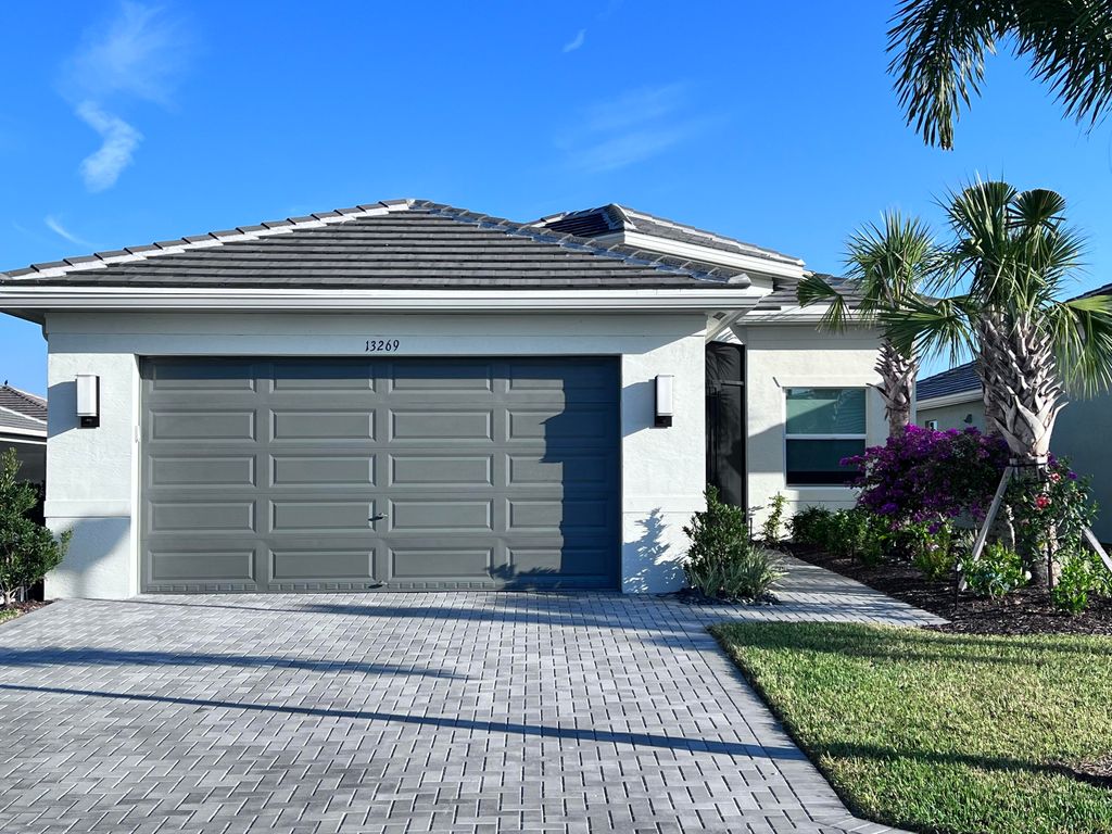 Photo of 13269 SW Blue River Road, Port Saint Lucie, FL 34987 (MLS # R10879694)
