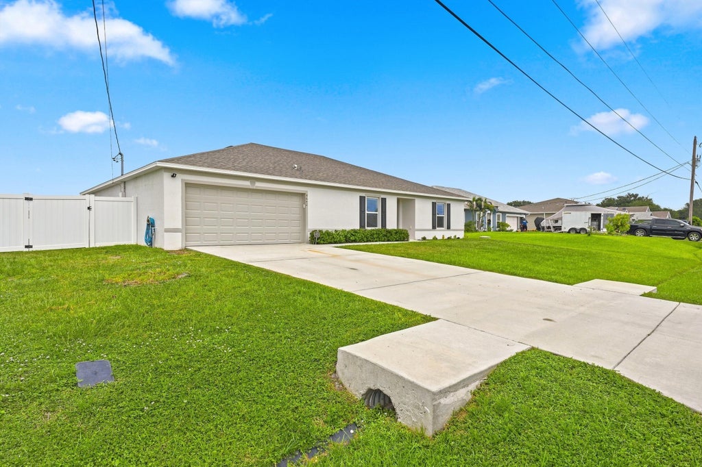 Photo of 4642 SW Paley Road, Port Saint Lucie, FL 34953 (MLS # B26059061)