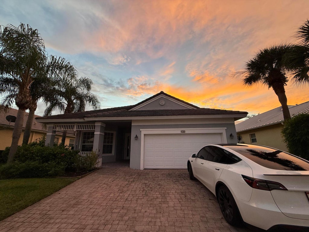 Photo of 109 NW Pleasant Grove Way, Port Saint Lucie, FL 34986 (MLS # R11118758)