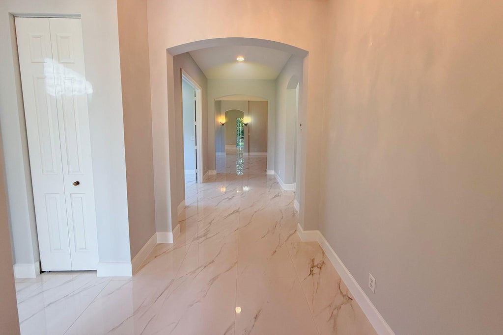 Photo of 109 NW Pleasant Grove Way, Port Saint Lucie, FL 34986 (MLS # R11118758)