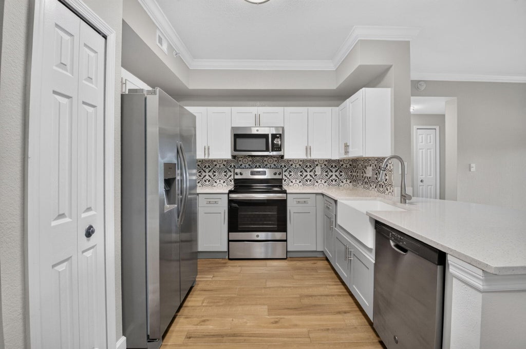 Photo of 15055 MICHELANGELO Boulevard #102, Delray Beach, FL 33446 (MLS # B26066467)