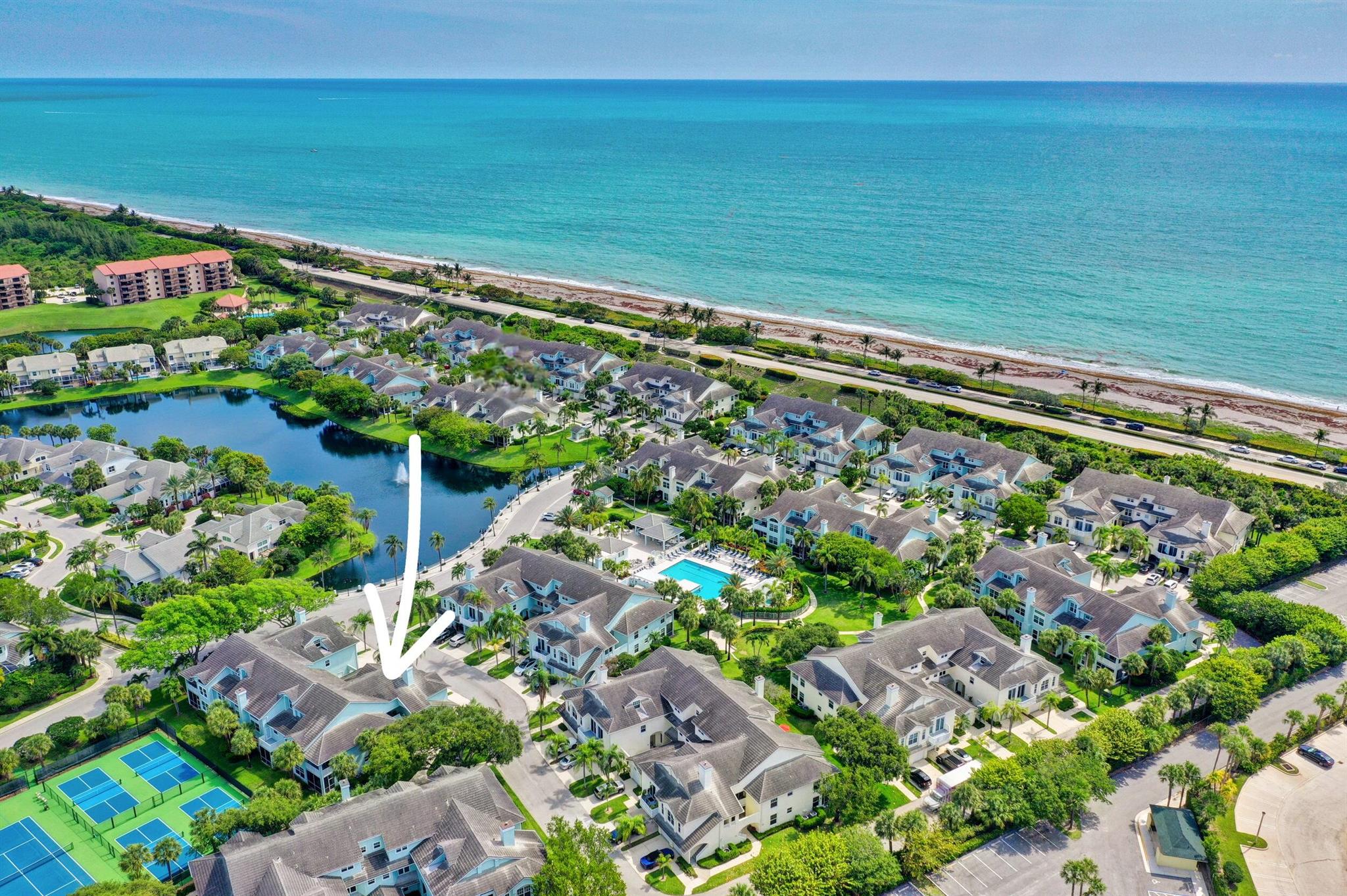 AVAILABLE - 2 Pets Max Seasonal $8,00.00 (6 month min.) or Annually $5,500.00 This beautiful, pet-friendly beachside condo is just a short stroll from Jupiter's dog-friendly beach! Bright and airy with abundant natural light, it features 2 bedrooms, 2 bathrooms, a 1-car garage, a and a balcony overlooking the lake off the primary bedroom and dining room. Sea Colony is a 24-hour manned, gated community with two private access gates to Jupiter's pristine beaches. After a day at the beach, unwind in the newly renovated resort-style pool and hot tub. Grill dinner on the spacious poolside deck while enjoying the water feature, tropical lighting, and ocean breeze. The community also offers an on-site gym, pickleball, and tennis courts.