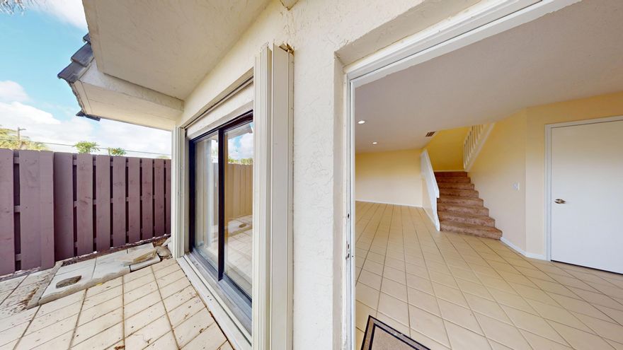 Discover this spacious 3-bedroom, 2.5-bath townhome in the Woodstock neighborhood of West Palm Beach! Enjoy two private balconies, including a private balcony off the master bedroom, and a fenced-in courtyard, perfect for relaxing or entertaining ,plus the convenience of an in-unit washer and dryer. The inviting master suite also offers plenty of space for a king-size bed, along with comfort and privacy. The community features a refreshing pool for added enjoyment. Ideally located near the Tanger Outlet Mall, Target, and plenty of restaurants. Just minutes from Downtown WPB, this home blends comfort, style, and convenience. **2-Car Max Per HOA *620+ Credit Score