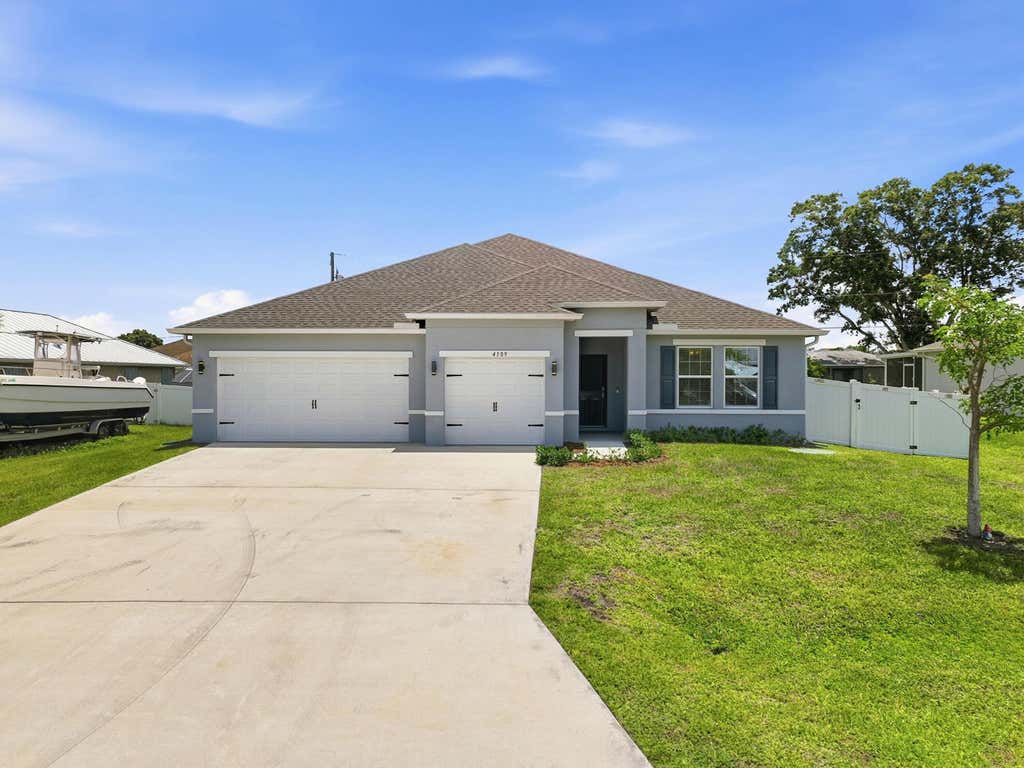 Photo of 4509 SW Tabor Street, Port Saint Lucie, FL 34953 (MLS # B26039875)