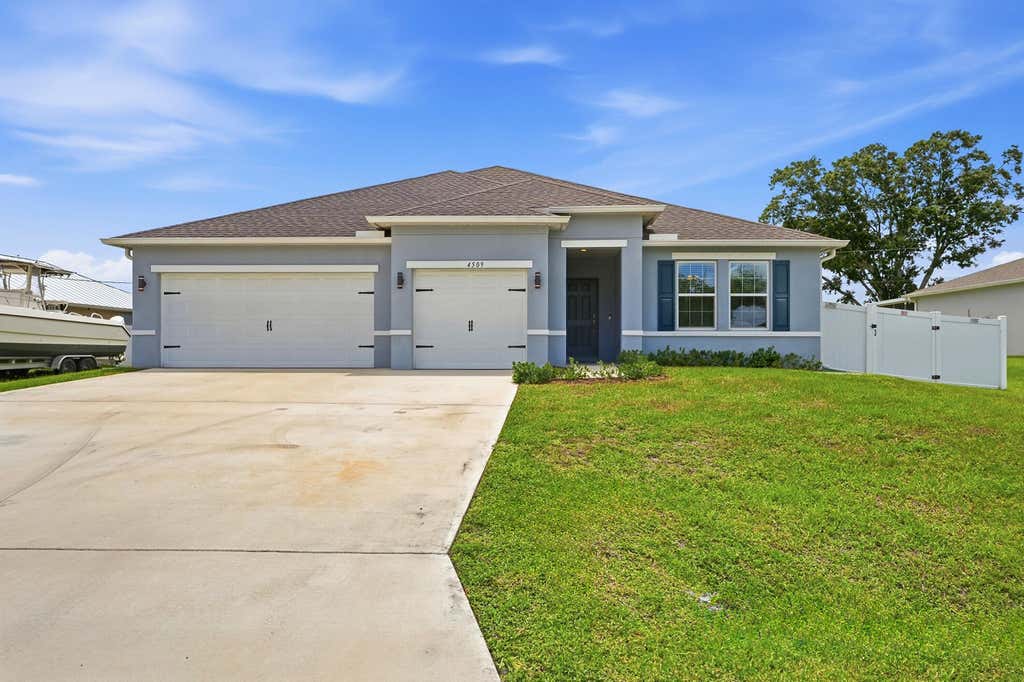 Photo of 4509 SW Tabor Street, Port Saint Lucie, FL 34953 (MLS # B26039875)