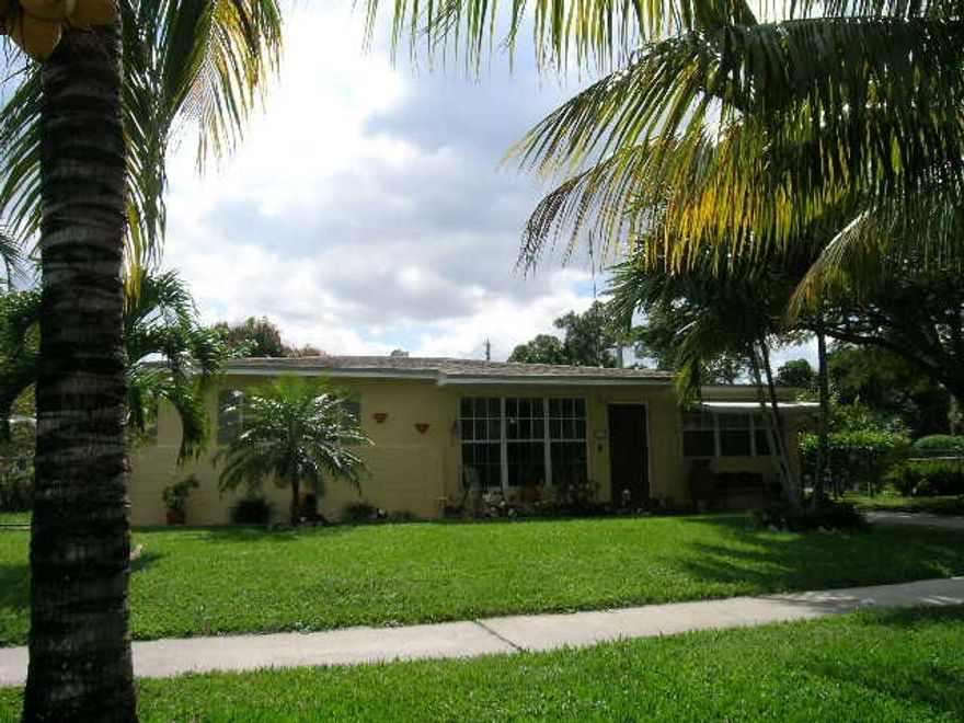 All measurements approx. Beautiful updated home in excellent condition. Very clean. Ceramic tile floor throughout. Roof only 6 yrs old, A/C 3 years. Large corner lot with many fruit trees. Too many extras to list. Call listing agent for more information.