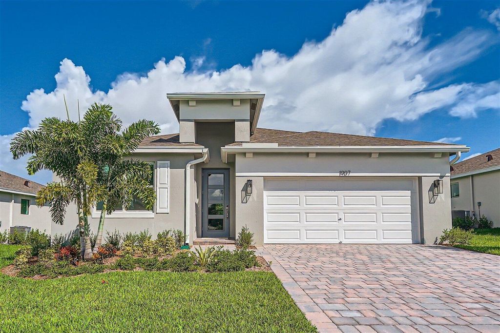 Photo of 1907 NE Ocean Dunes Drive, Jensen Beach, FL 34957 (MLS # R10908061)