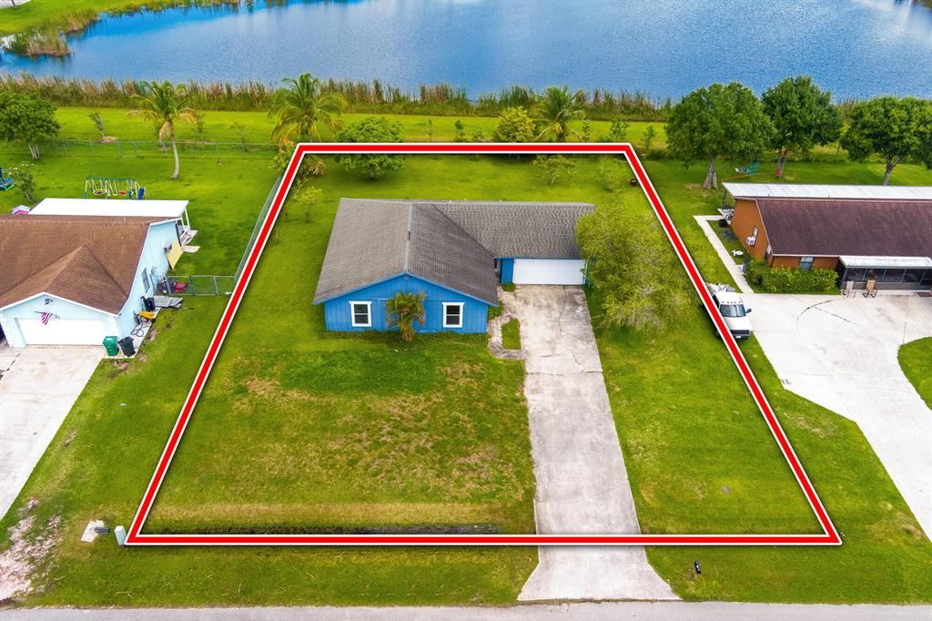 Photo of 101 Sandalwood Drive Dr, Fort Pierce, FL 34947 (MLS # R10807759)