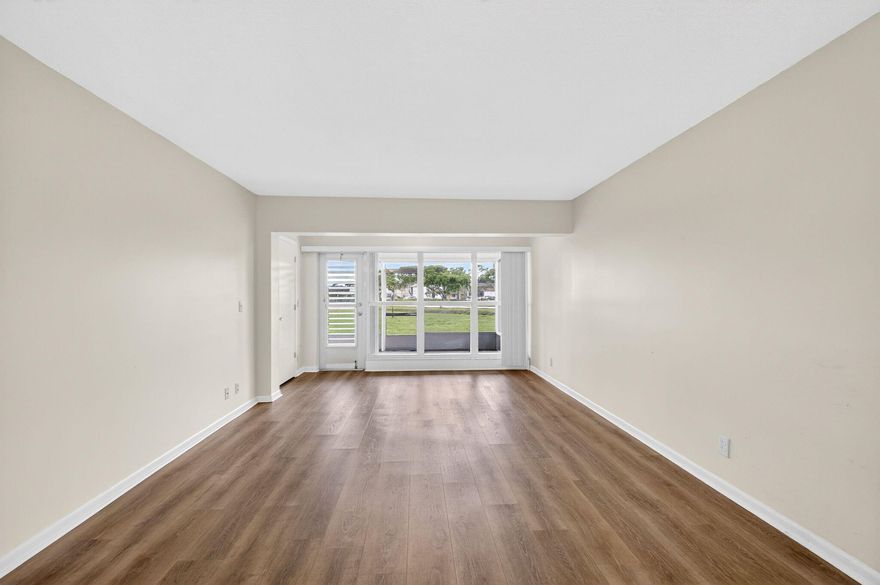 Rare first-floor opportunity in the desirable Pines of Delray West 55+ community. This move-in-ready condo features vinyl flooring, an in-unit washer and dryer, and peaceful garden views. Enjoy storm protection with complete accordion hurricane shutters. Accessibility features include an accessible front entry and walk-in shower. Bright, clean, and easy living in a vibrant community with great amenities, including a clubhouse, pool, fitness center, tennis & pickleball courts, billiards, and bocce ball. Your low monthly HOA includes water, sewer, trash, cable, internet, and exterior insurance. Ideally located just minutes from downtown Delray Beach, shopping, dining, and the beach! PROFESSIONAL PHOTOS COMING SOON!