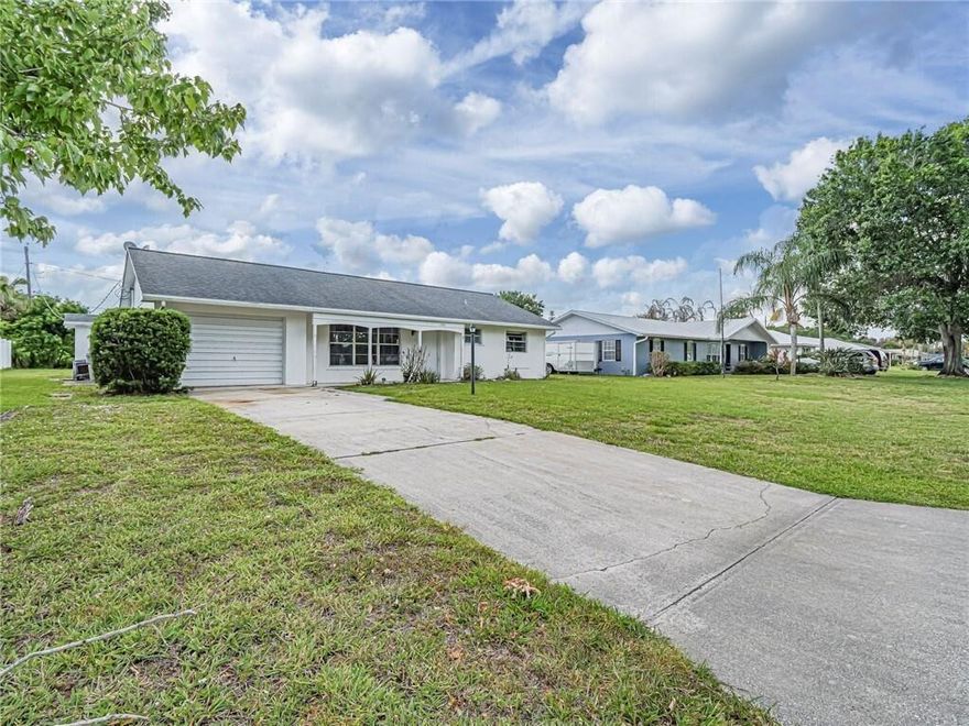 Catch the breeze + settle into this charming 2/2 close to the beach. Designed w/ laid-back surf vibes this home blends comfort + versatility w/ a splash of style. Durable + stylish tile-looking laminate floors flow throughout. Updated galley kitchen, featuring stainless appliances, is efficient + inviting, offering ample storage. Easy living layout keeps everything w/in reach! Enclosed Florida room adds a whole extra dimension usable as flex space: gym, 3rd bed, a sunlit home office. Huge backyard offers room to relax + entertain. Great neighborhood - this one delivers lifestyle + location!