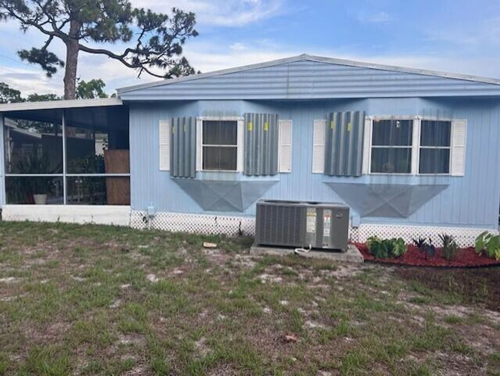 Photo of 10 Arboles Lane, Port Saint Lucie, FL 34952 (MLS # R11094893)