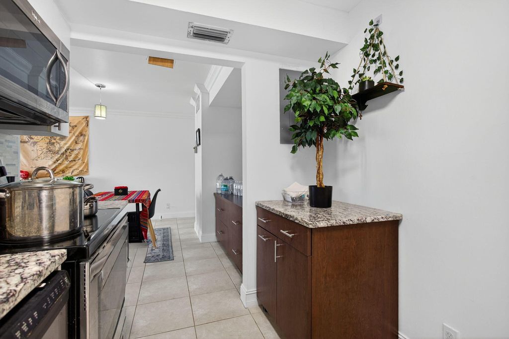 Photo of 1428 SE 4th Avenue #102, Deerfield Beach, FL 33441 (MLS # R11144024)