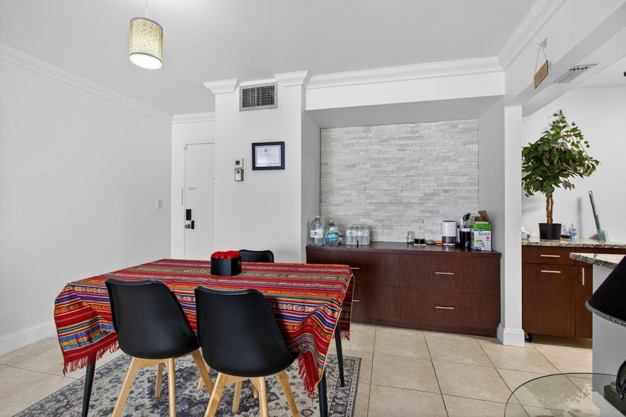 Just listed! Spacious 1BD/1.5BA first-floor condo in desirable Deerfield Pines! Bright open layout, newer AC, 2024 electric panel, and tile flooring--no carpet! Large primary suite plus guest half-bath. Prime East Deerfield location near the beach, US-1, shops, dining, and I-95. No leasing allowed, making this a quiet, owner-occupied community. Easy to show and offered by a motivated seller! Strong value and low-maintenance living--don't miss it!