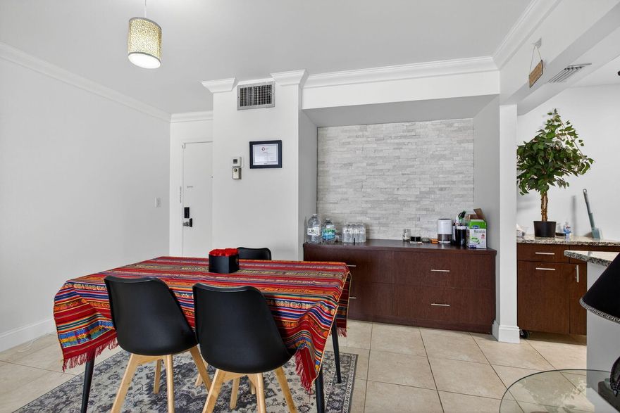 Just listed! Spacious 1BD/1.5BA first-floor condo in desirable Deerfield Pines! Bright open layout, newer AC, 2024 electric panel, and tile flooring--no carpet! Large primary suite plus guest half-bath. Prime East Deerfield location near the beach, US-1, shops, dining, and I-95. No leasing allowed, making this a quiet, owner-occupied community. Easy to show and offered by a motivated seller! Strong value and low-maintenance living--don't miss it!