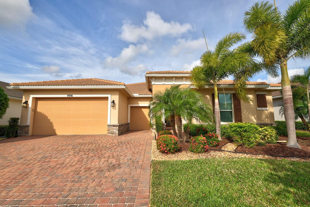 Photo of 9991 SW Coral Tree Circle, Port St Lucie, FL 34987 (MLS # R10879443)