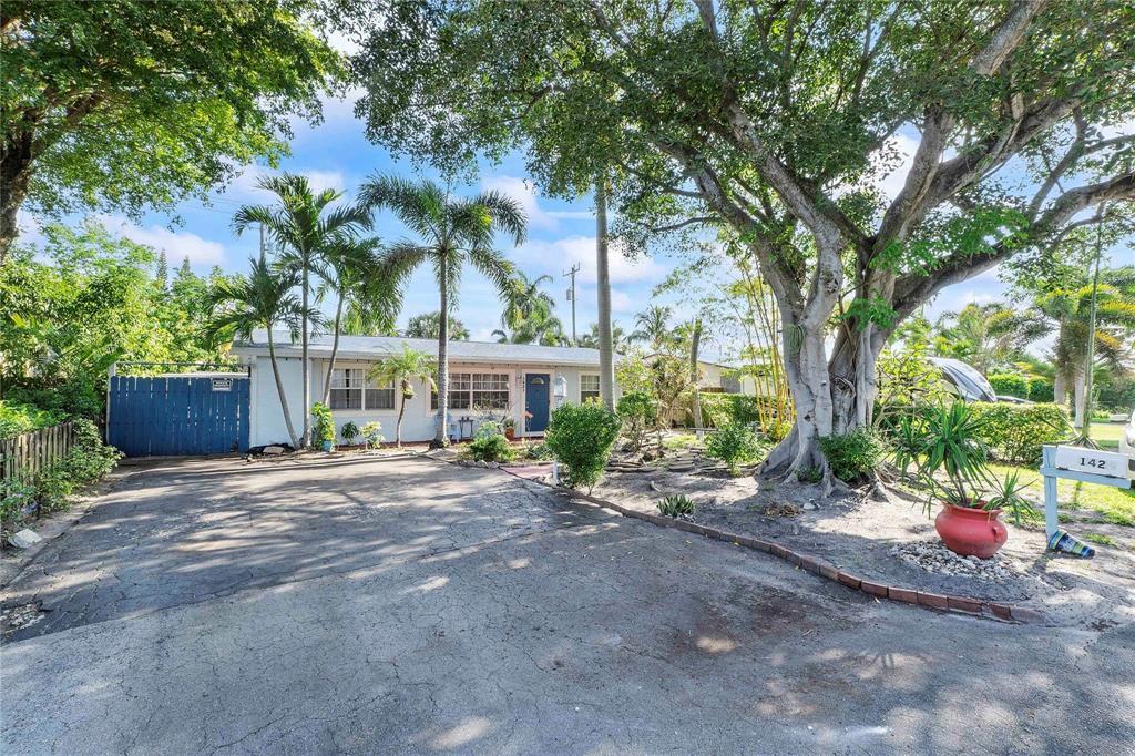 Photo of 1427 NE 30th Street, Pompano Beach, FL 33064 (MLS # B26044933)