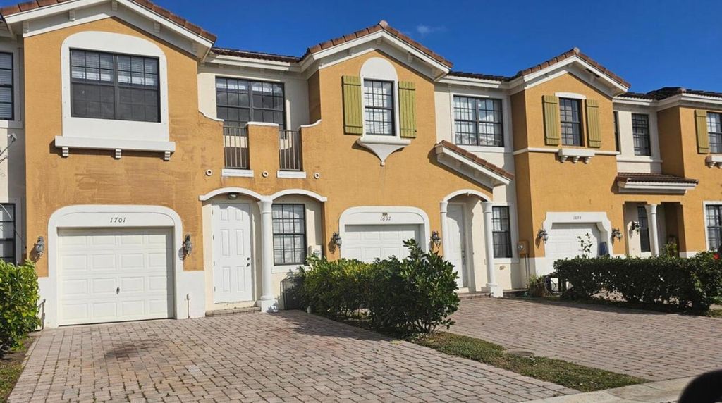 Photo of 1701 SW Umbria St, Port Saint Lucie, FL 34953 (MLS # R10992767)