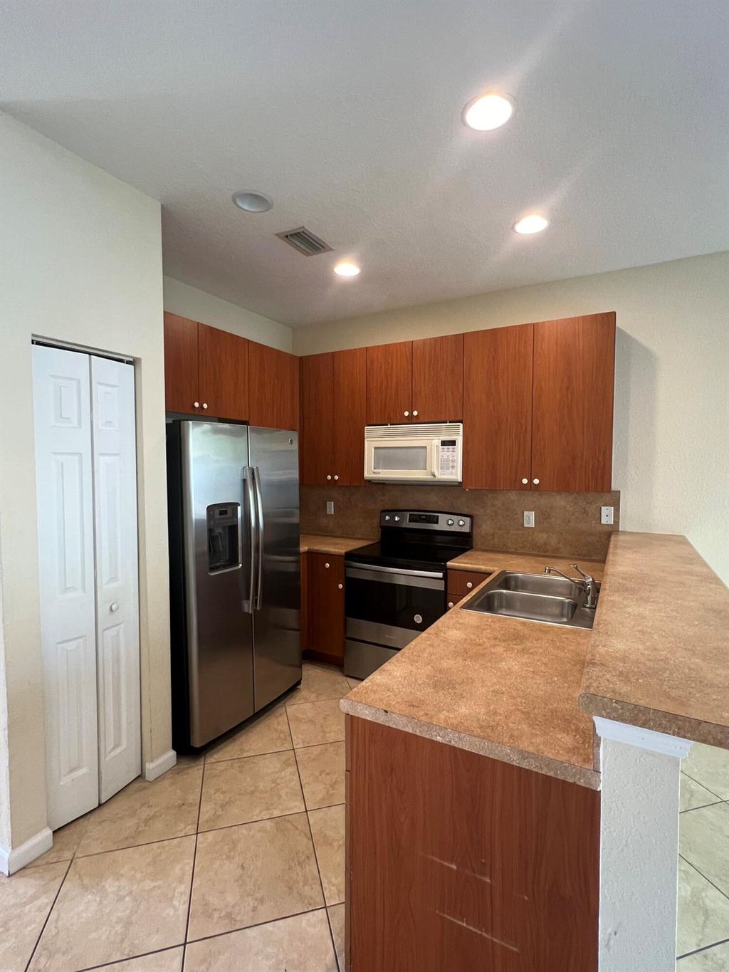 Photo of 1701 SW Umbria St, Port Saint Lucie, FL 34953 (MLS # R10992767)