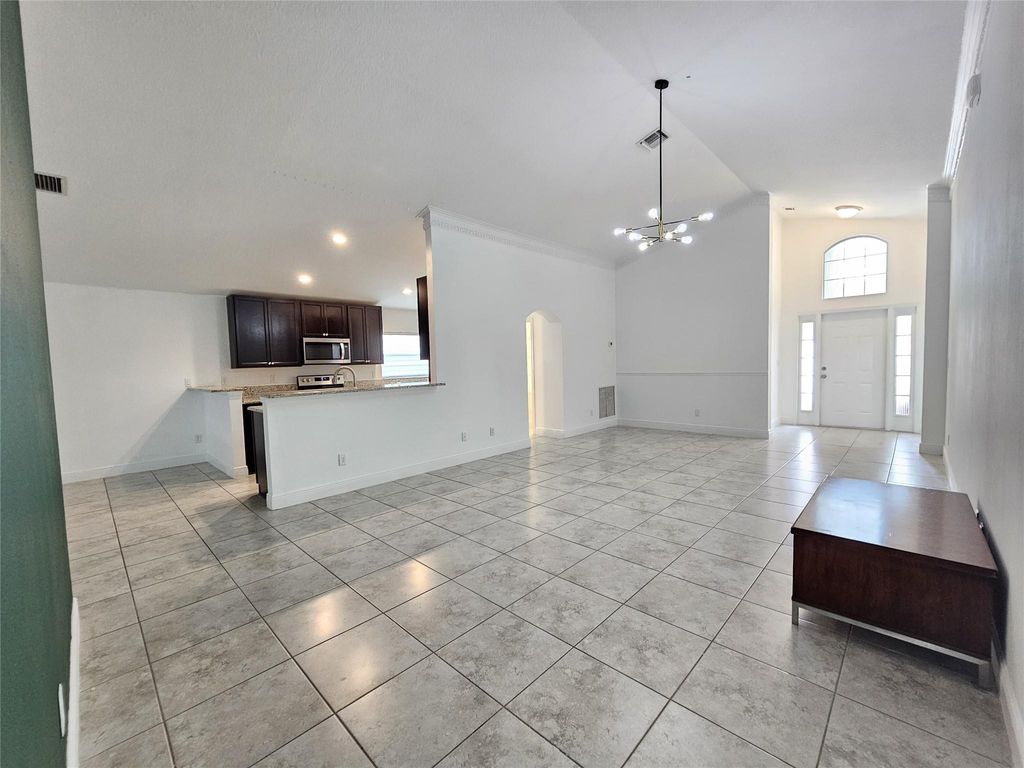 Photo of 329 Palm Breezes Dr, Fort Pierce, FL 34945 (MLS # F10525324)