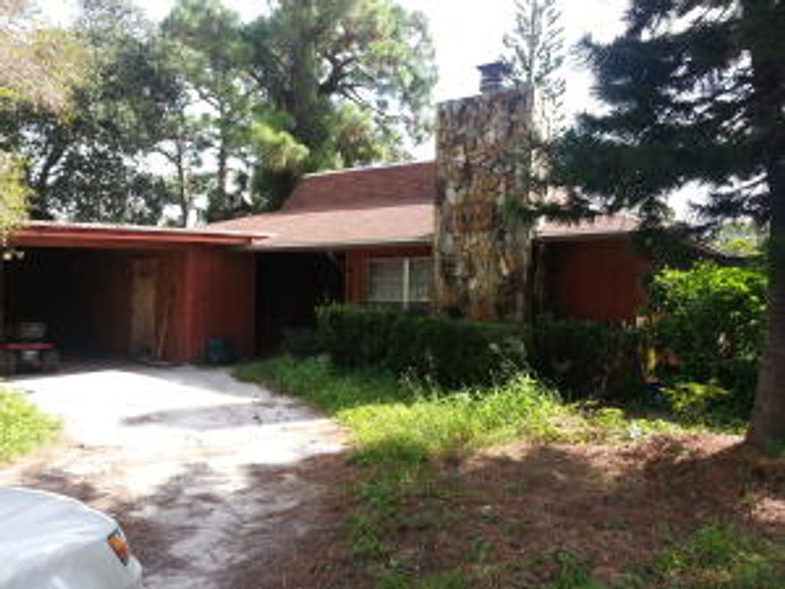 This home is located close to Westwood High School.  Needs TLC.  Includes 3 lots and a corner.