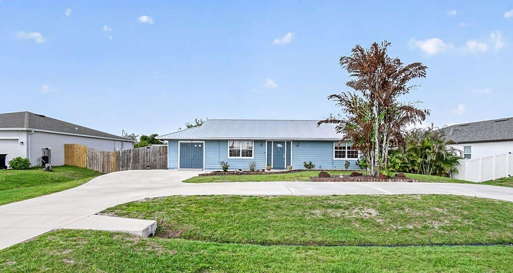 Photo of 1146 SW Del Rio Boulevard, Port Saint Lucie, FL 34953 (MLS # B26021142)
