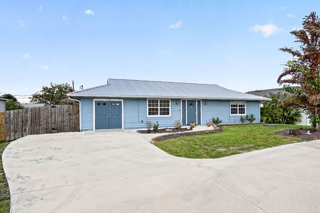 Photo of 1146 SW Del Rio Boulevard, Port Saint Lucie, FL 34953 (MLS # B26021142)