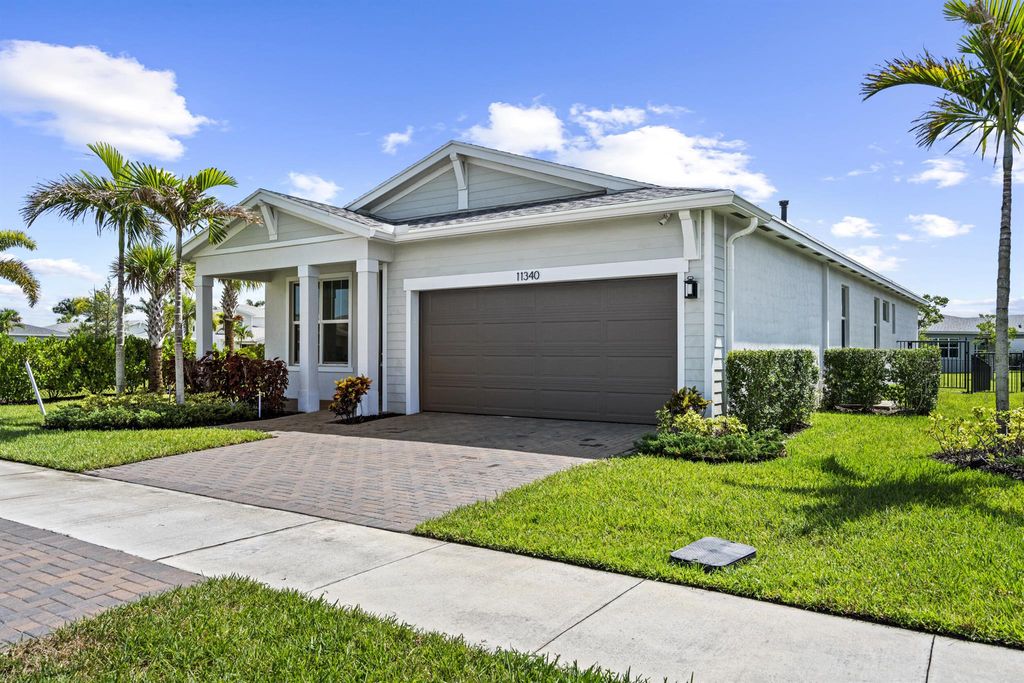 Photo of 11340 SW Lyra Drive, Port Saint Lucie, FL 34987 (MLS # R11116881)