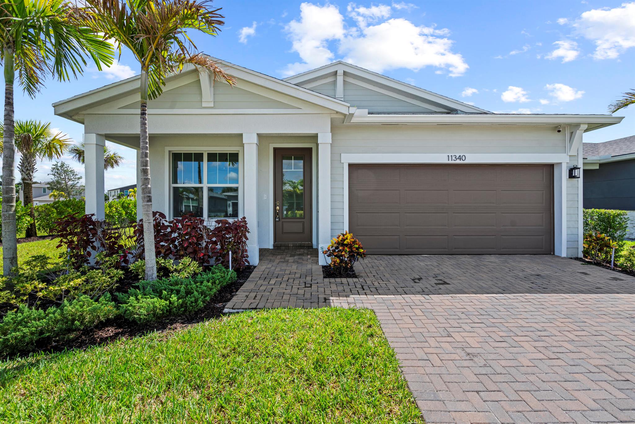 Step into comfort and style with this stunning lake view 3-bedroom, 2.5-bath home in a gated community. The gourmet kitchen boasts a new refrigerator, a beautiful island, and ample storage, while the master suite offers a spacious walk-in closet and a dual-sink bathroom. The home is enhanced by ceiling fans in all three bedrooms and the living room, along with the added security of impact glass and doors. Enjoy the screened-in patio and fenced yard--perfect for relaxing, entertaining, or pets. Added conveniences include a walk-in pantry and a laundry room with a brand-new washing machine. The community features a resort-style pool, clubhouse, fitness center, pickleball, basketball, dog park, and more, with lawn care, cable, and internet included. Don't miss out--book your tour today!