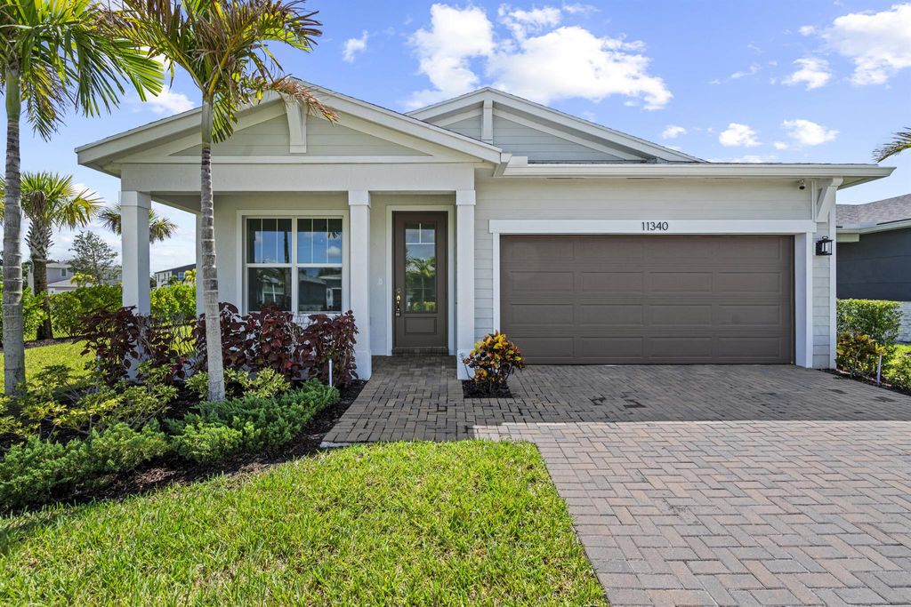Photo of 11340 SW Lyra Drive, Port Saint Lucie, FL 34987 (MLS # R11116881)
