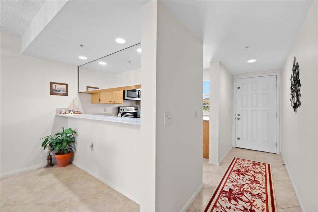 Photo of 2001 Marina Isle Way #405, Jupiter, FL 33477 (MLS # B26053499)
