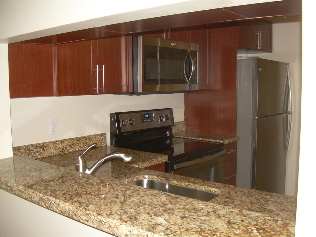 Photo of 6796 Palmetto Circle S #203, Boca Raton, FL 33433 (MLS # R10955450)