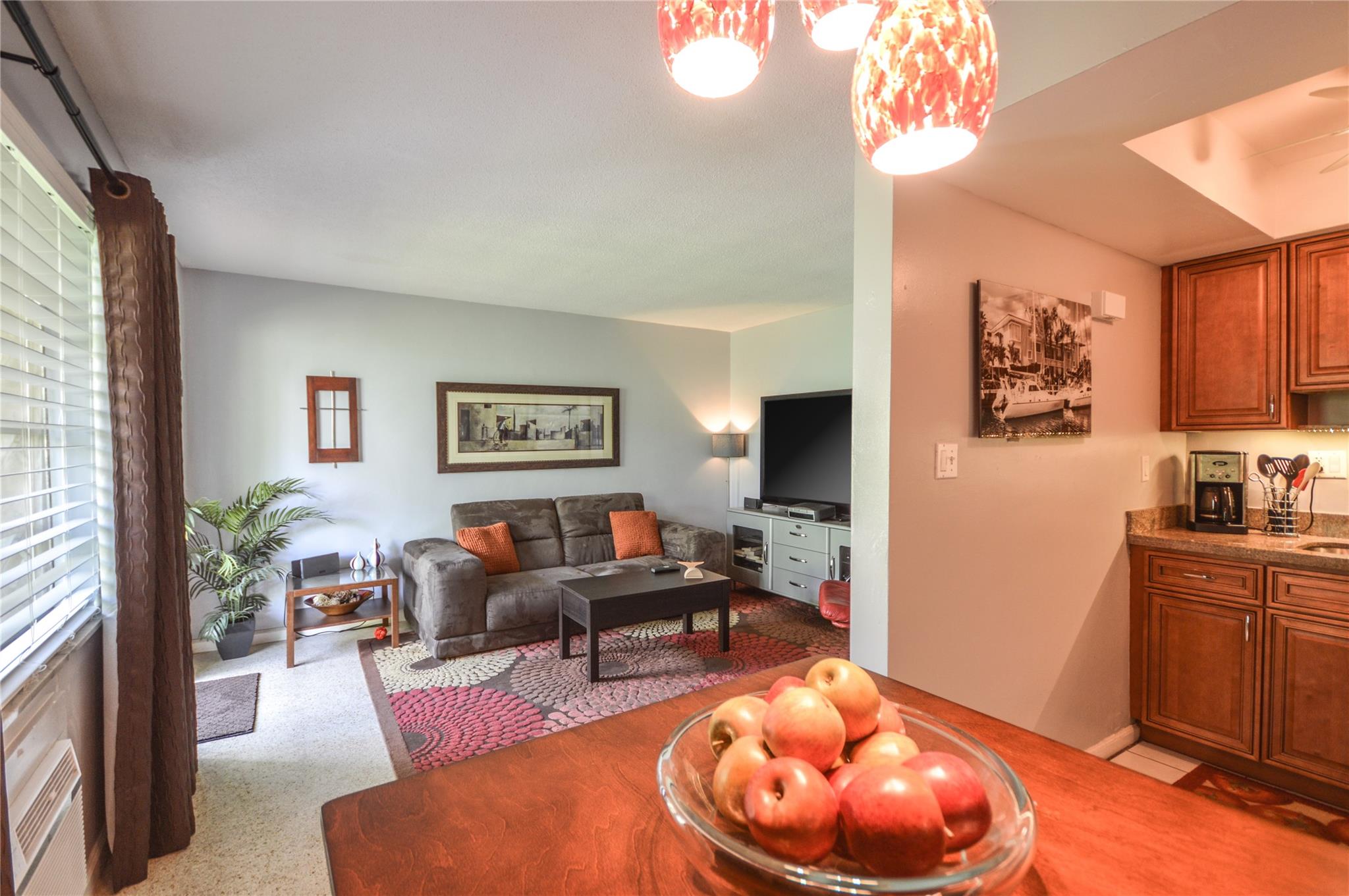 Located in the southeast section of Victoria Park amidst a lush garden setting, this apartment is simply adorable. The ample sized bedroom has a large walk in closet. New mini split air conditioner units in both the bedroom and living area. Impact windows and doors. Granite surface in the kitchen. Bathroom has a tub shower combination. Freshly painted. Gorgeous refinished terrazzo floors. Washer and dryer on premises and no extra charge. One small pet allowed with approval. Walk to Las Olas, Annie Beck Park(great to launch a kayak or paddle board) and bike to the beach. Spotless and ready for occupancy. 650 Min. FICO score.