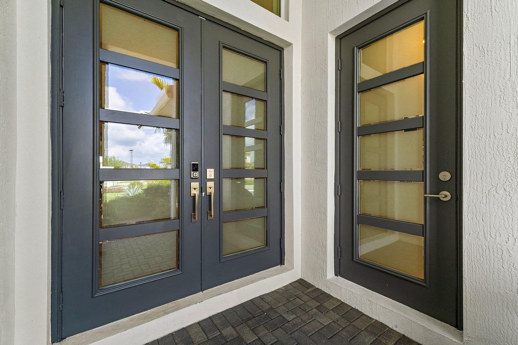 Photo of 12208 Waterstone Circle, Palm Beach Gardens, FL 33412 (MLS # B26011484)