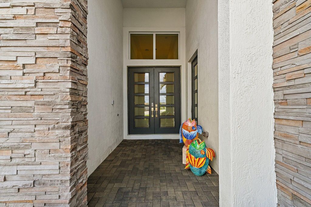 Photo of 12208 Waterstone Circle, Palm Beach Gardens, FL 33412 (MLS # B26011484)