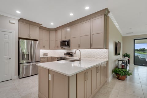 Photo of 4425 BEAUTY LEAF Circle, Vero Beach, FL 32967 (MLS # B26073153)