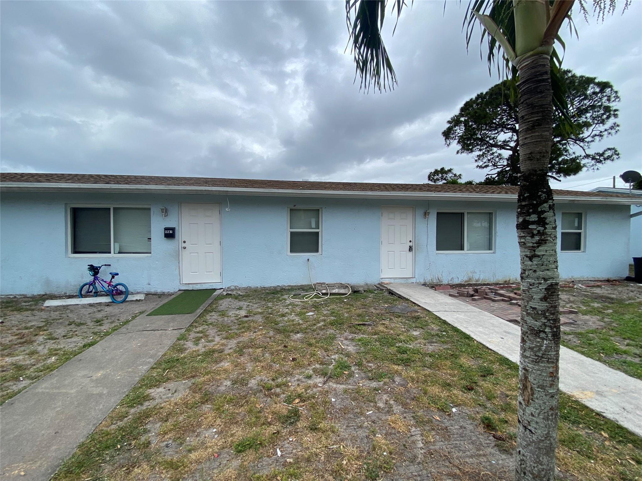 Must see, All new unit completely remodeled half of Duplex. This 3-bedroom unit has all new Kitchen with shaker cabinets and quartz countertops, all new tile flooring throughout home, all new bathroom, all new Hurrican windows and doors, freshly painted throughout. Not to mention full size washer and dryer. This will not last call today for your private showing.
