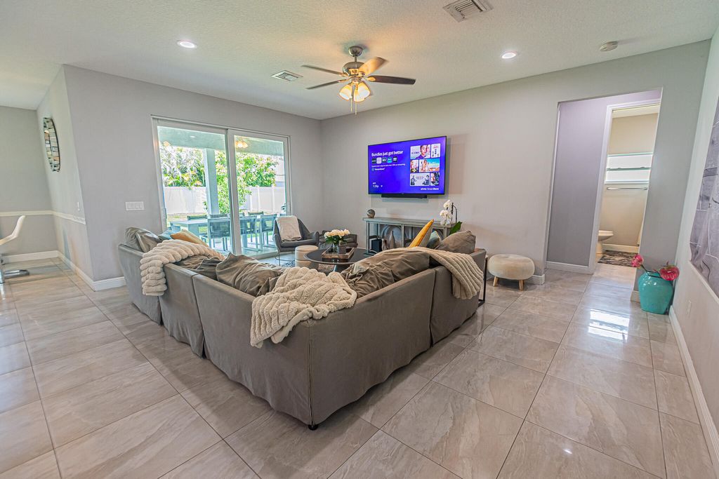 Photo of 1201 SE Mendavia Avenue, Port Saint Lucie, FL 34952 (MLS # B26026158)