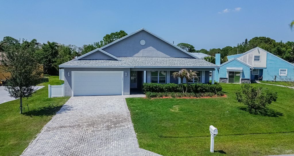 Photo of 1201 SE Mendavia Avenue, Port Saint Lucie, FL 34952 (MLS # B26026158)