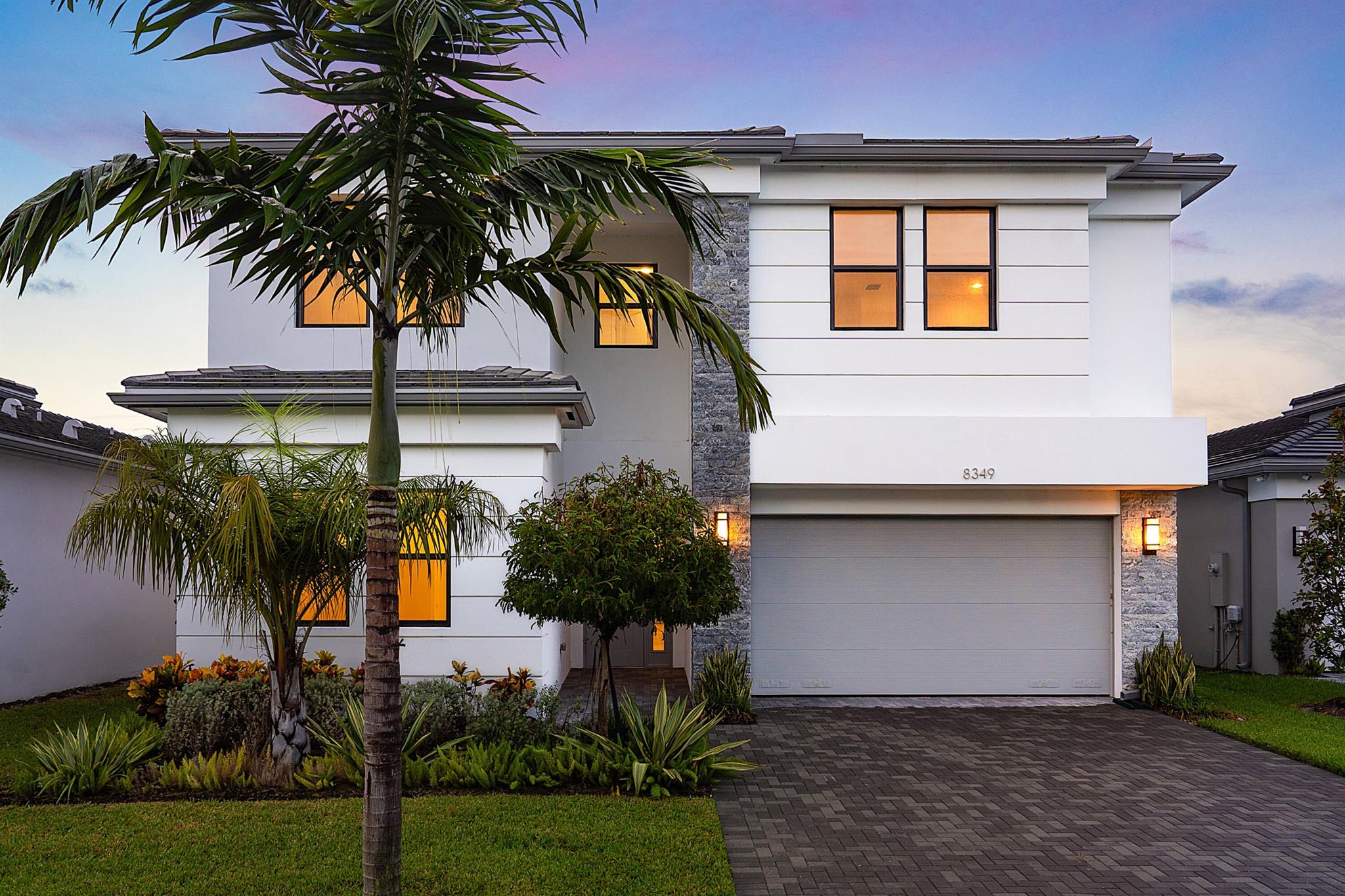 Spectacular brand new, never lived in spacious family home in Lotus Palm of Boca Raton. Polynesia model with over 4,600 square foot built by GL Homes. 5 bedrooms, 7 bathrooms, 2 car garage with a private, lushly landscaped backyard. White porcelain tile floors. Chef's kitchen with a natural gas cooktop and an oversized GE refrigerator. Hurricane windows and doors. Close proximity to the expansive brand new 26,500 square foot clubhouse which boasts extensive amenities: 6 tennis courts, 5 pickleball courts, the Crave restaurant and pool-side bar, fitness center, yoga garden, full indoor basketball court, children's arcade, four gleaming pools and a spa. Prime location off Glades Road near all of Boca Raton's best shopping, dining and top rated schools. Live a Floridian dream lifestyle!