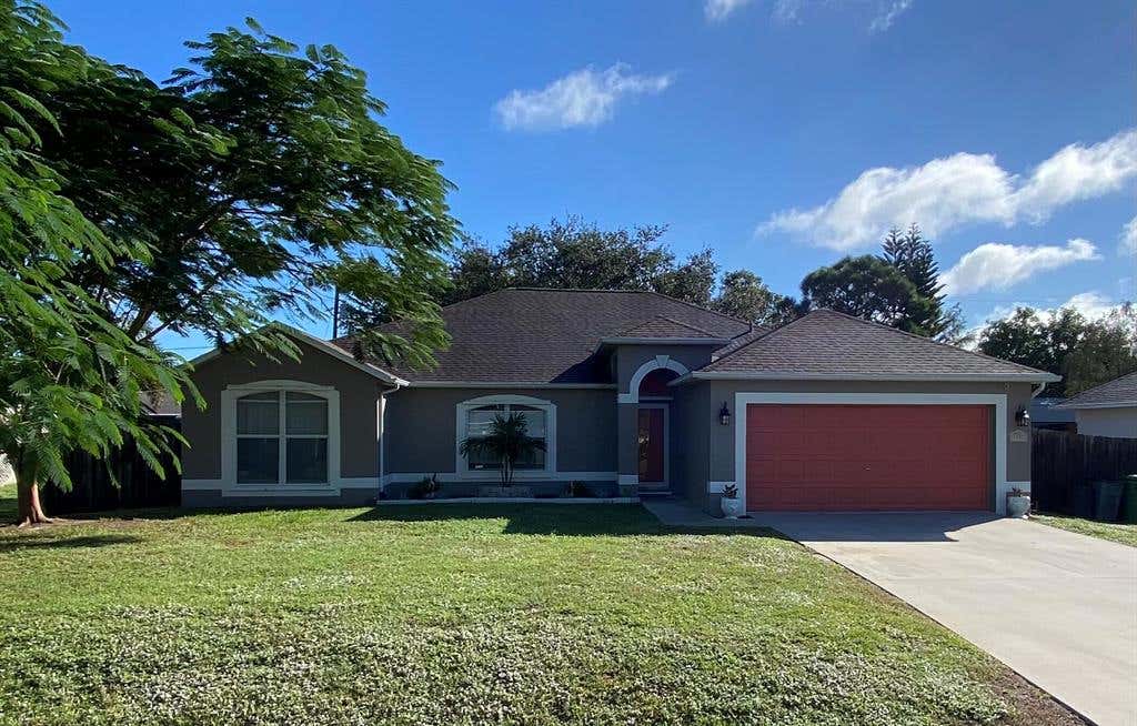Photo of 1157 SW Hibiscus Street, Port Saint Lucie, FL 34983 (MLS # R10762179)