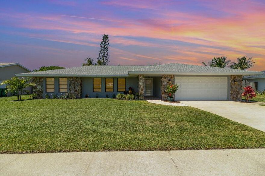 BRAND NEW ROOF 7/15/2025! Step inside this beautifully UPDATED 4BR/3BA SPLIT floor plan home where every bedroom fits a KING bed and offers its own WALK-IN closet. Fresh COASTAL-NEUTRAL paint and COREtec LVP flooring flow seamlessly throughout, while the bathrooms shine with MODERN fixtures and lighting. The airy living space opens to an oversized SCREENED PORCH and sparkling RESURFACED POOL (2022). HVAC replaced in 2022, GARAGE with new EPOXY flooring, plus INDOOR LAUNDRY, With abundant STORAGE. This home delivers comfort, style, and space to gather, grow, or simply relax in your own retreat.