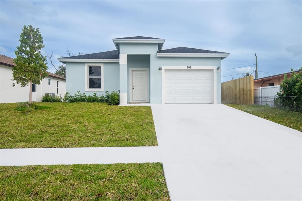 Photo of 306 Walker Avenue W, Greenacres, FL 33463 (MLS # B26004227)