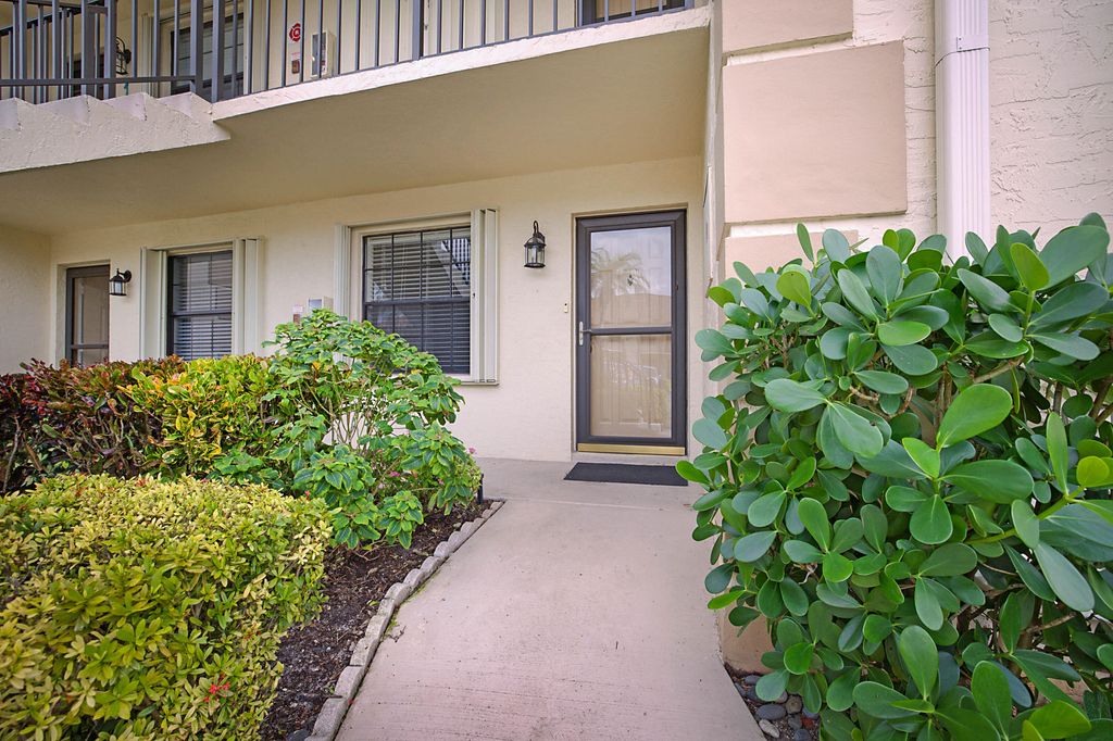 Photo of 1201 Pinecrest Circle #D, Jupiter, FL 33458 (MLS # R10949874)