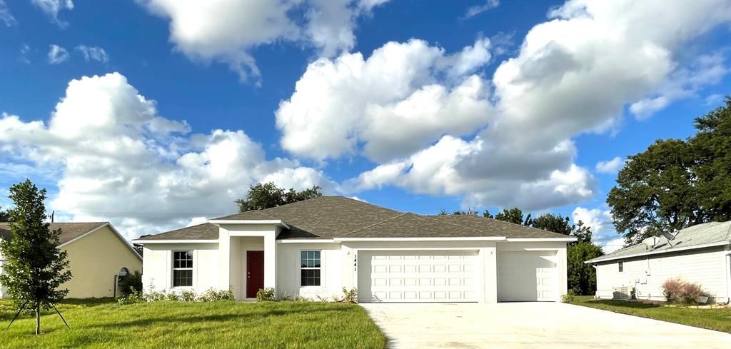 Photo of 1441 SW San Esteban Avenue, Port Saint Lucie, FL 34953 (MLS # R10756429)