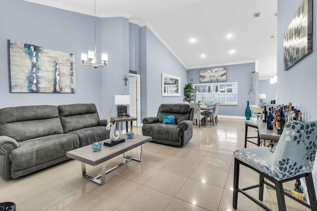 Photo of 160 Heatherwood Drive, Royal Palm Beach, FL 33411 (MLS # R10997383)