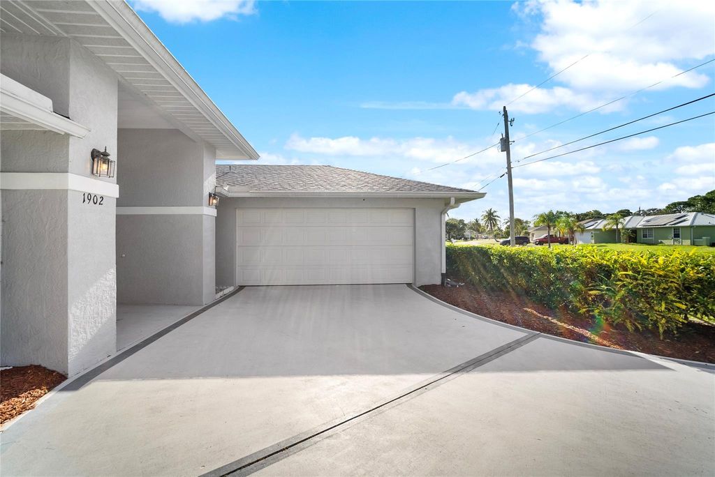 Photo of 1902 SE Gaskins Circle, Port Saint Lucie, FL 34952 (MLS # F10471106)