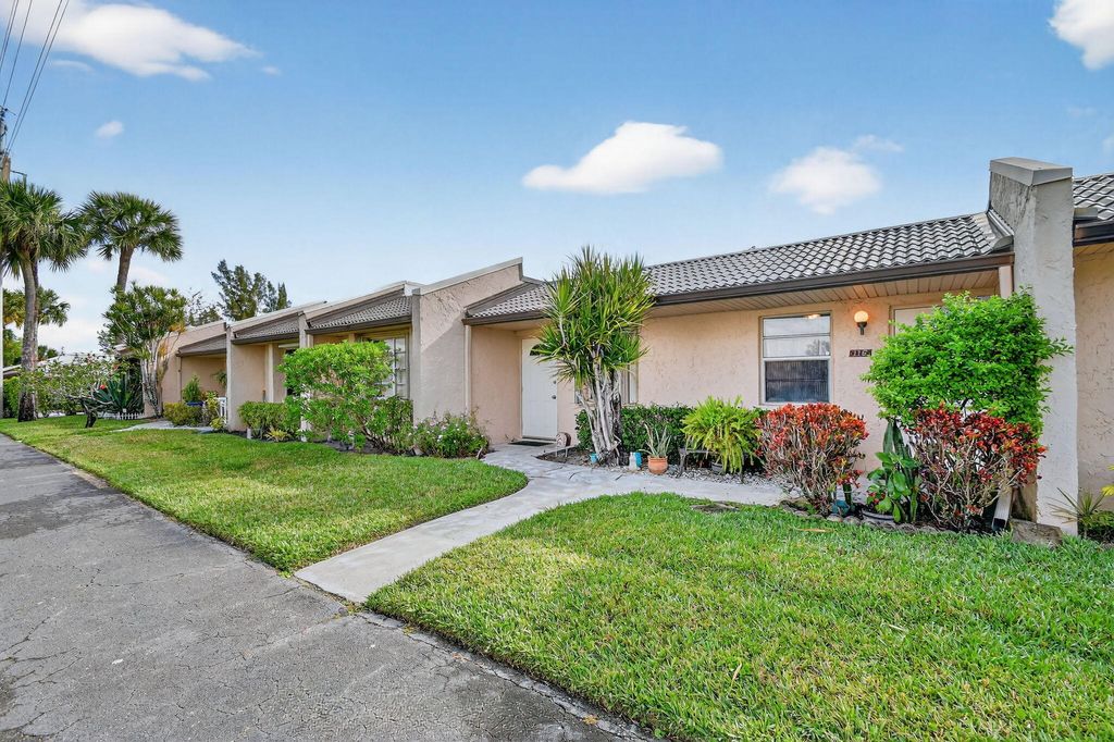 Photo of 116 Golden Lakes Blvd, West Palm Beach, FL 33411 (MLS # B26001203)